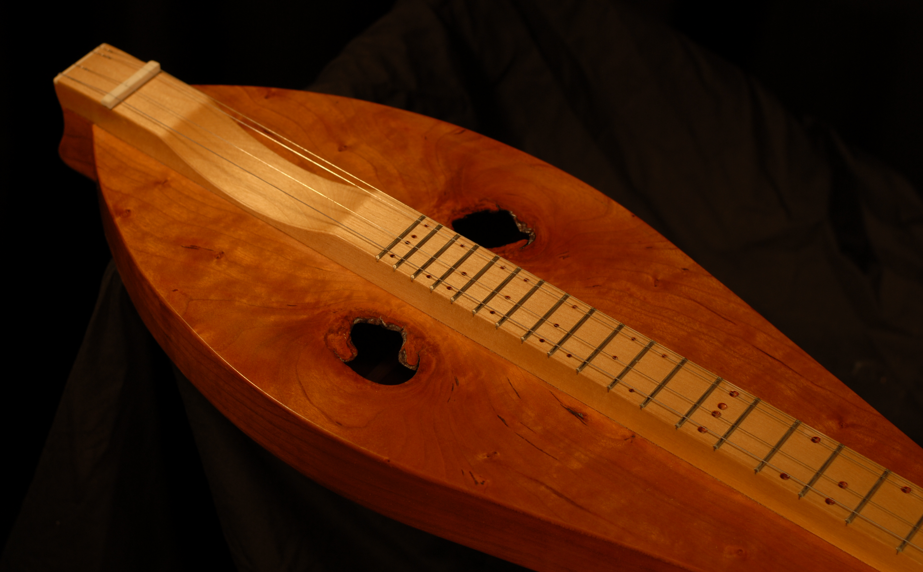 detail of the soundhole on michael mccarten's appalachian dulcimer model