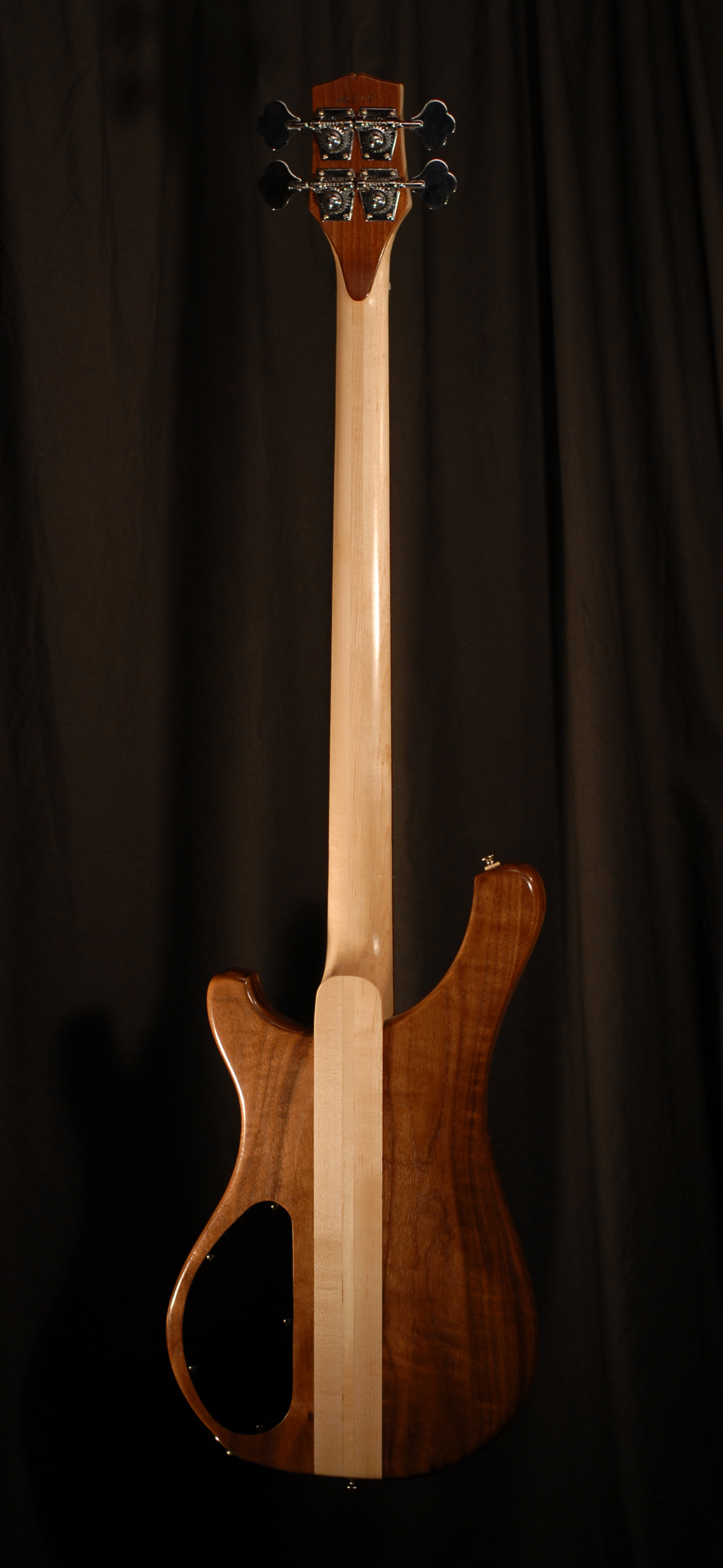 rear view of michael mccarten's double cutaway electric bass guitar model