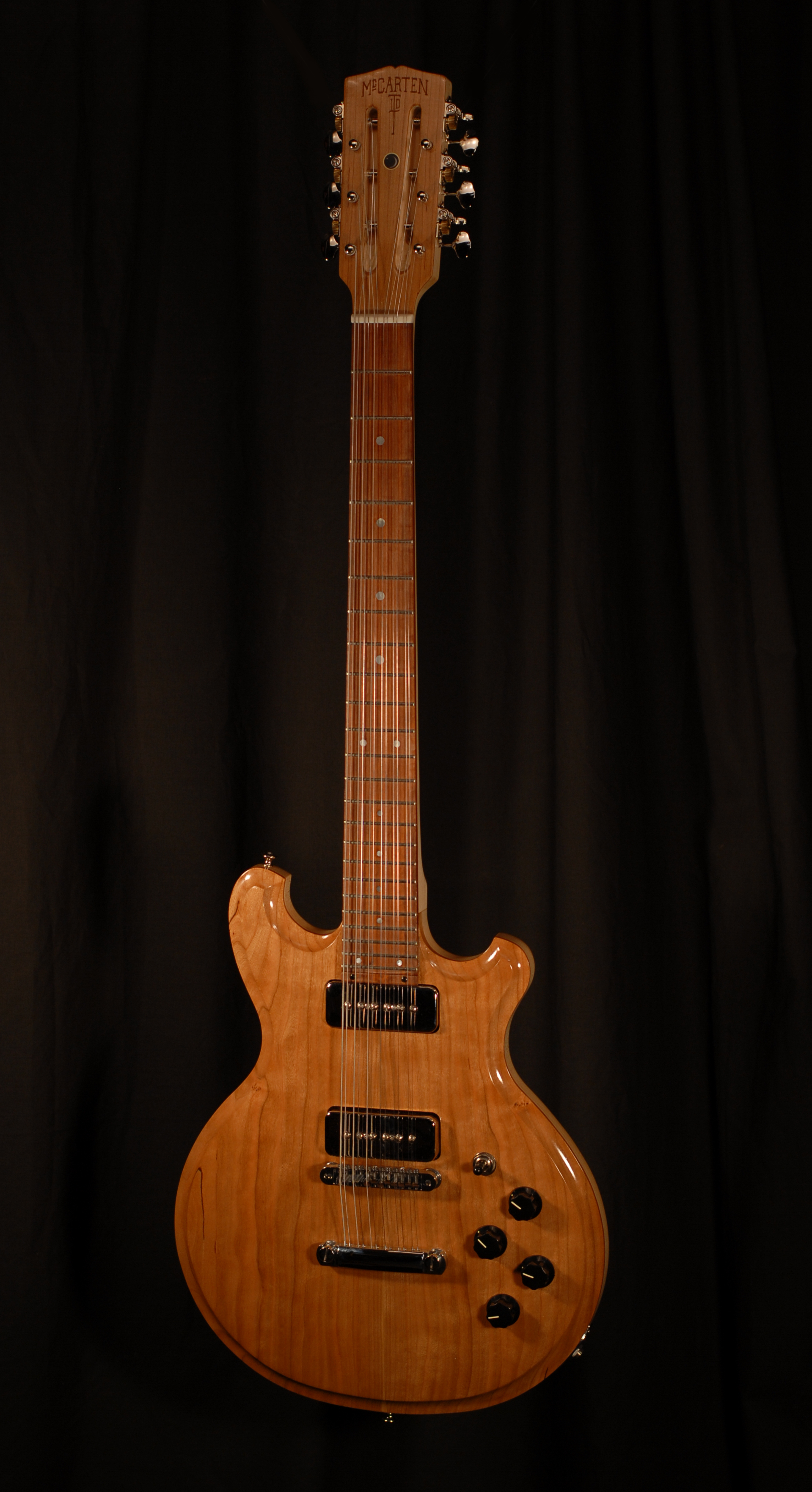 front view of michael mccarten's double cutaway electric 12 string guitar model